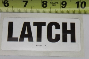 Genie Lift Part # 82239GT - DECAL,LABEL,LATCH, EA